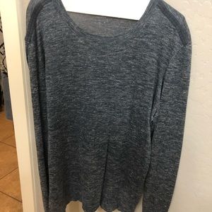 Dark grey/blue sweater.